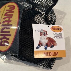 Muttluks. Size Medium. Brand new. Never been used.